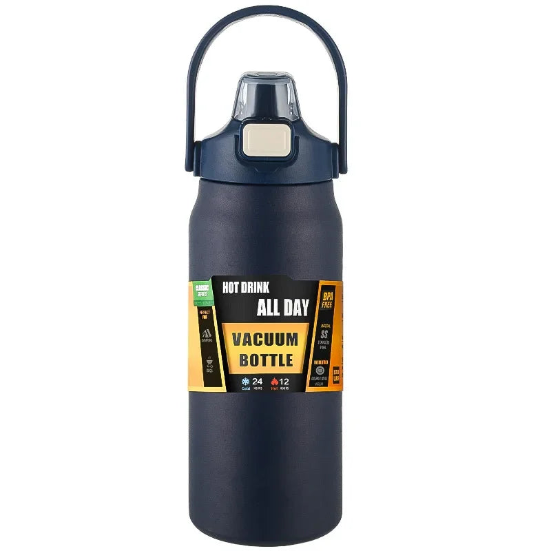 Hydra Max bleu minéral avec poignée intégrée et marquage "Vacuum Bottle", idéale pour boissons chaudes et froides.