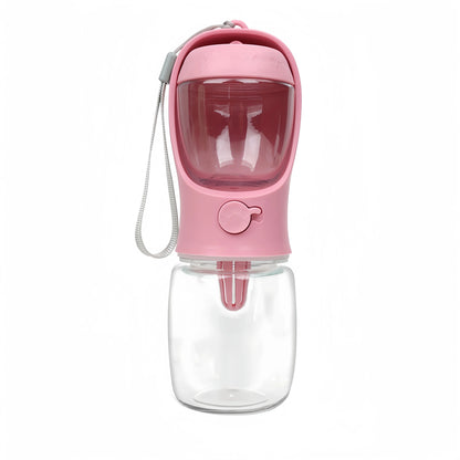 Gourde Duo Pet couleur rose avec double compartiment pour eau et croquettes, idéale pour animaux en déplacement.