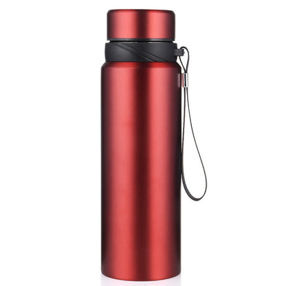 Hydra Thermo Elite couleur rouge métallisé, avec lanière noire pour transport facile.